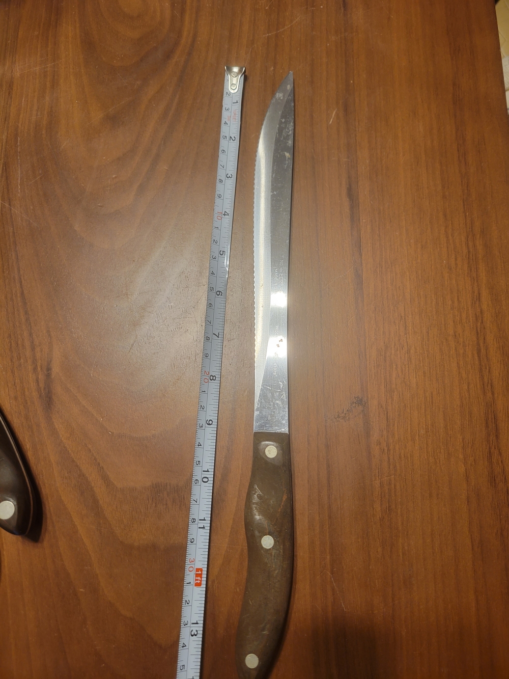 Cutco Wood-Handled Carving Knife in Brown and Silver